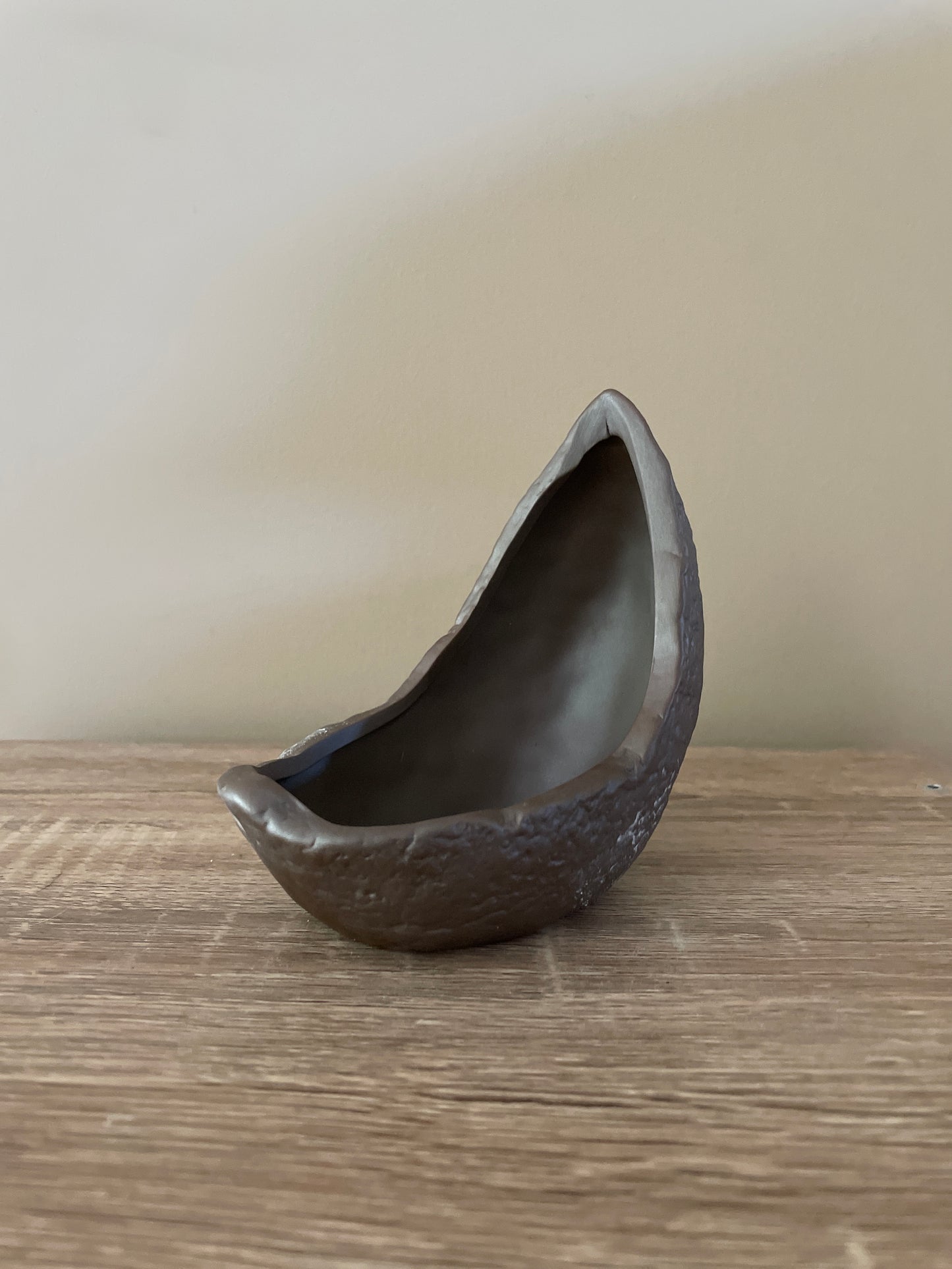crescent moon shaped pottery dish for small plants