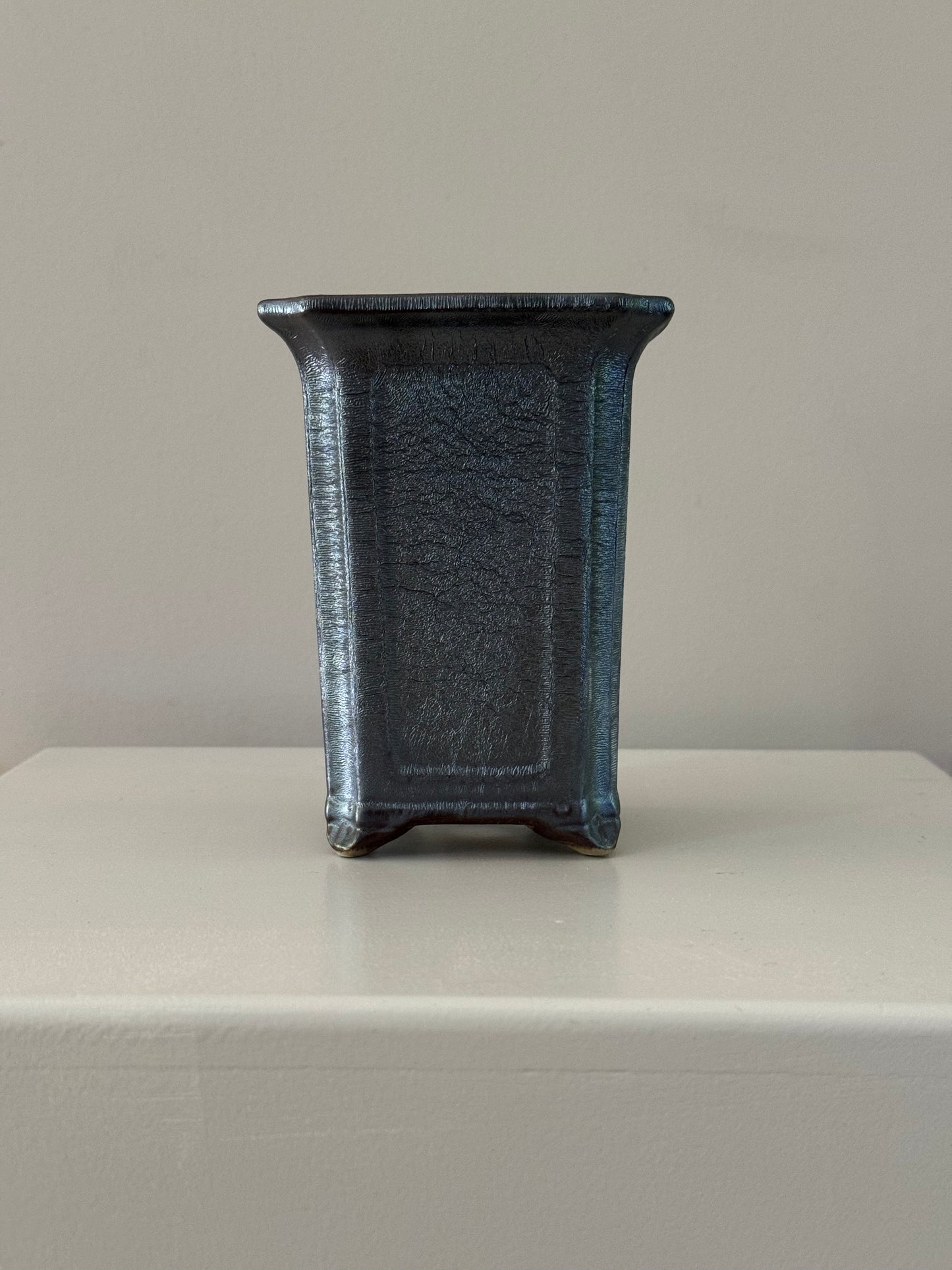 rough grey textured vase pot bonsai plant flowers