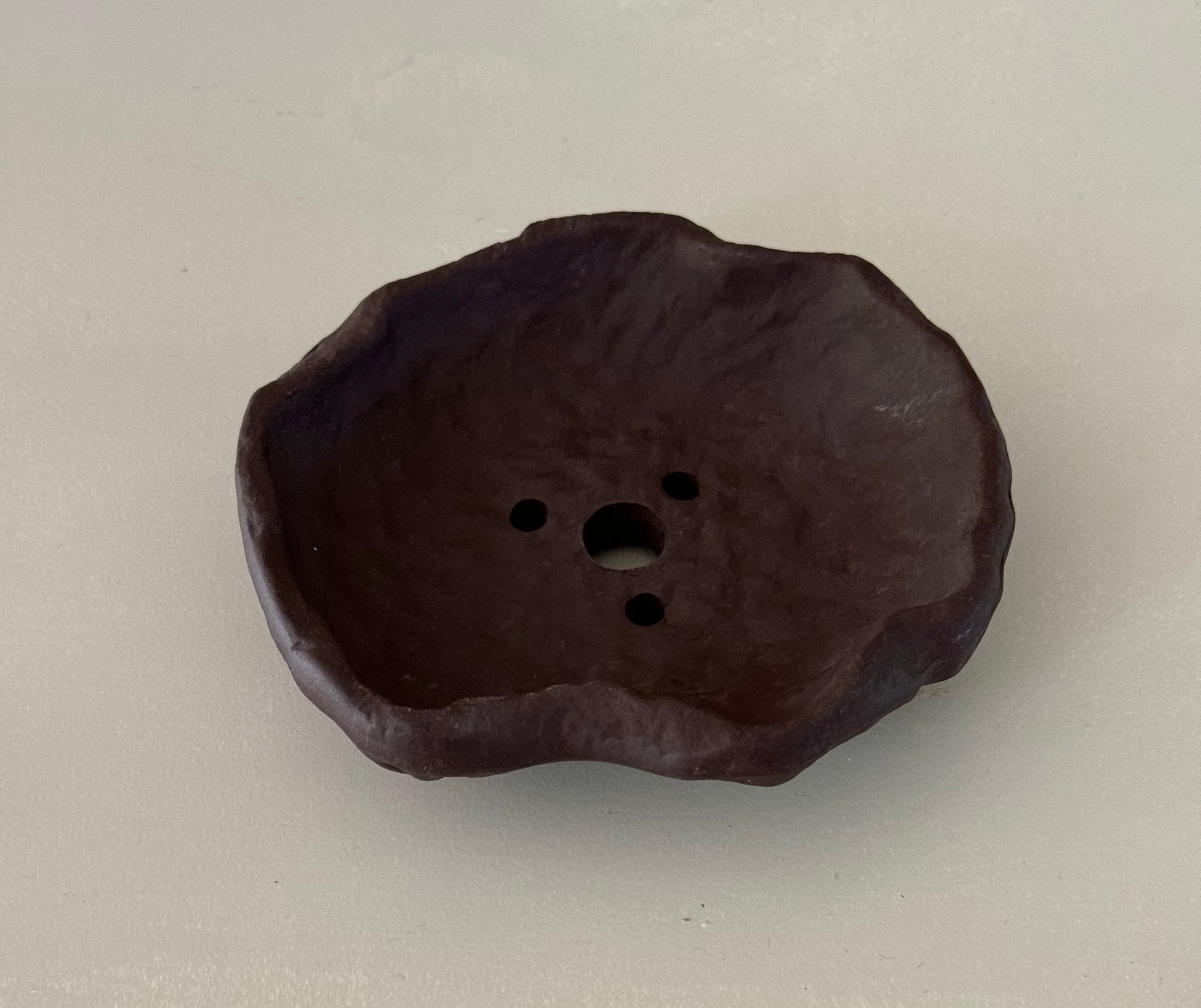 organic puddle shaped clay pot