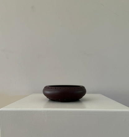 round small barrel style brown pot for plants