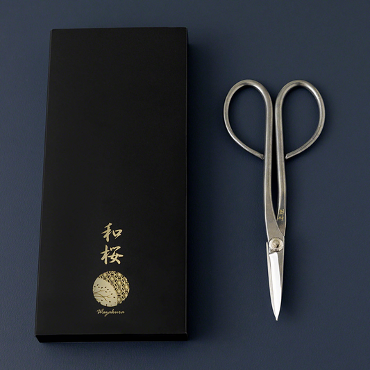 Wazakura Yasugi steel bonsai scissors beside their presentation box